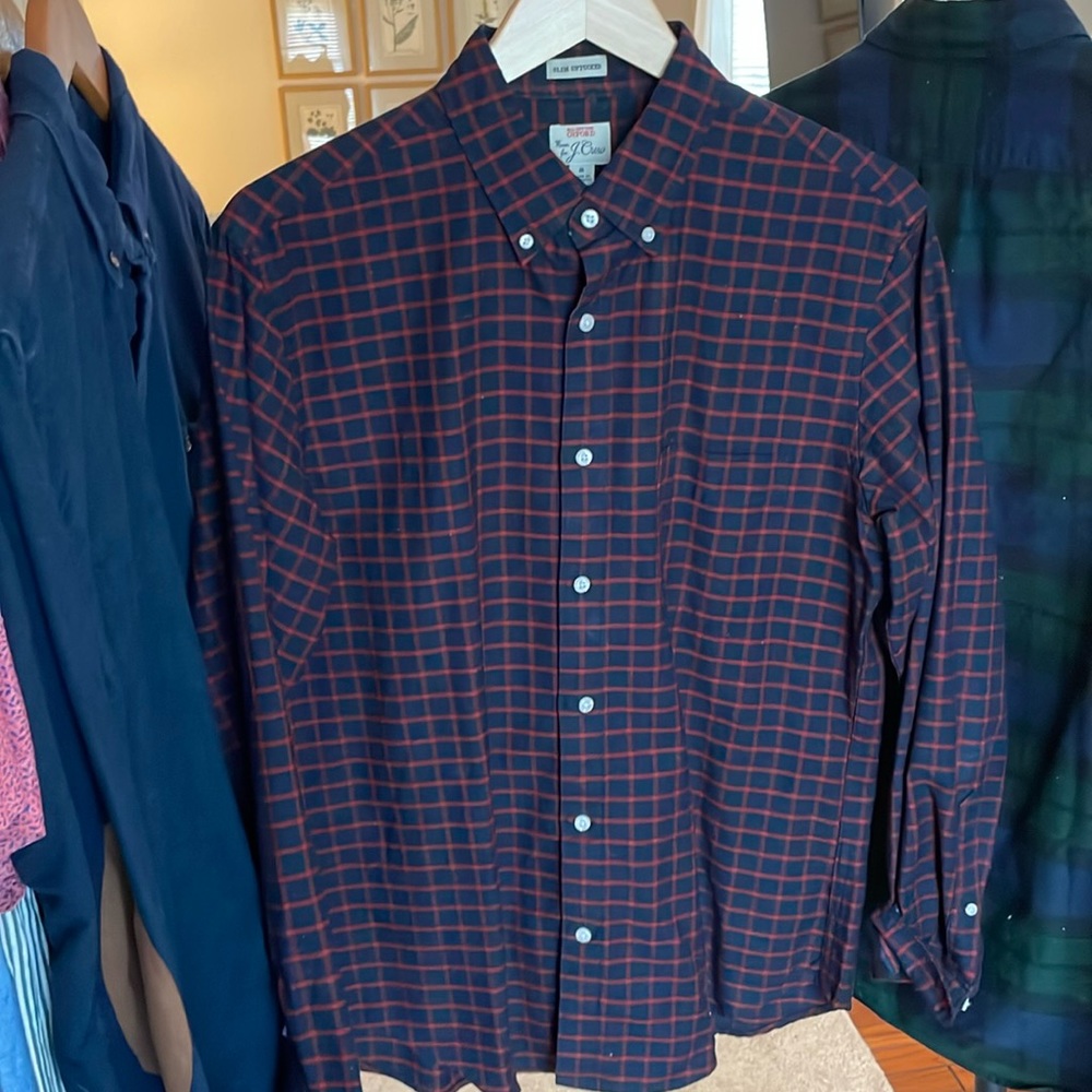 Navy button down shirt with red checker pattern